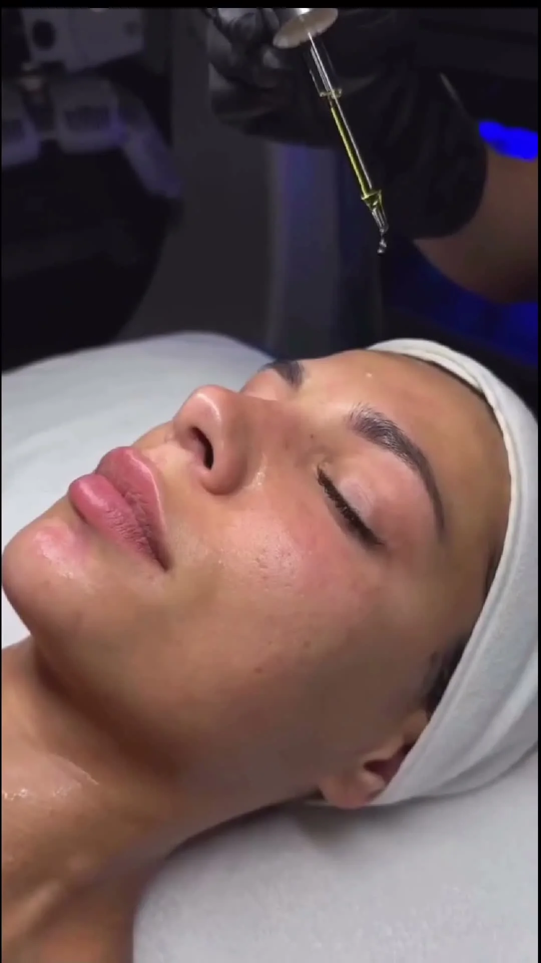 Serum application during a facial at Mac Esthetics